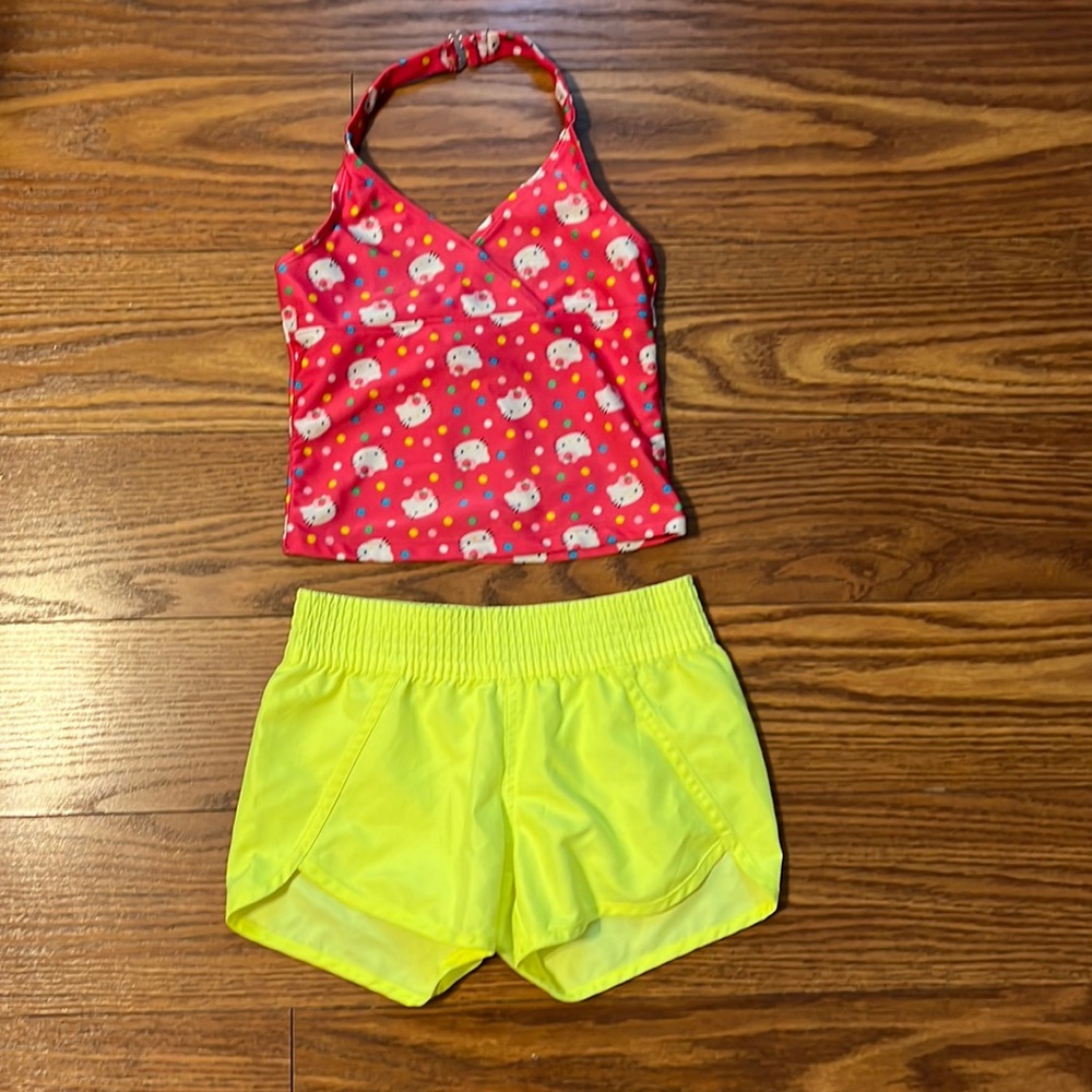 Hello kitty swim top with swim shorts.